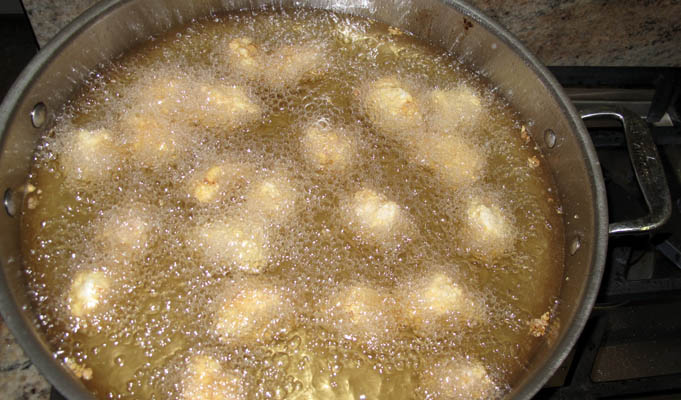 Orange chicken frying