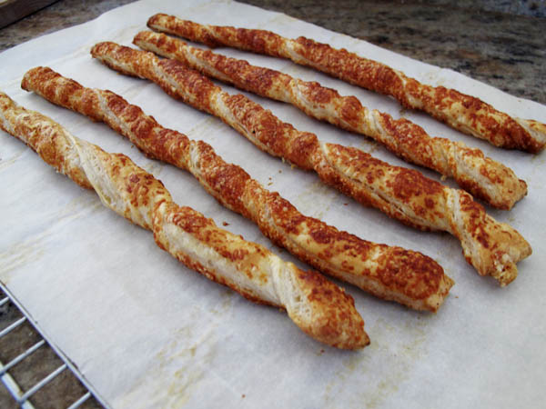 Parmesan cheese straws cooling